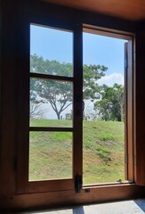 The view seen from a teak window.