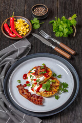 tasty cheese sweet corn pancakes with fried bacon