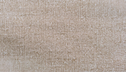 Light beige textured fabric showcasing intricate woven patterns, ideal for interior design and fashion applications, captured in natural light
