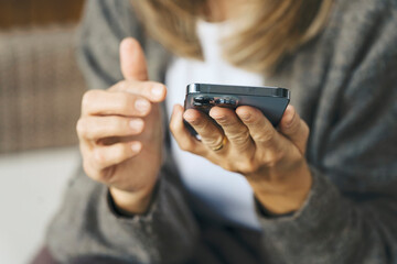 Engaging With Technology on a Casual Afternoon While Sitting Comfortably at Home