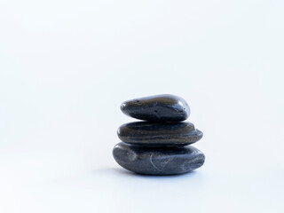 Meditation stones. Pyramid pebbles free space. Calm, buddhism symbol or aromatherapy set concept.