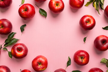 Many red apples on colored background, top view. Autumn pattern with fresh apple above view with copy space for design or text