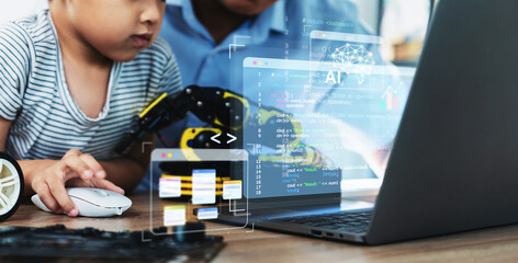 A little boy and teacher do robotic arduino project together