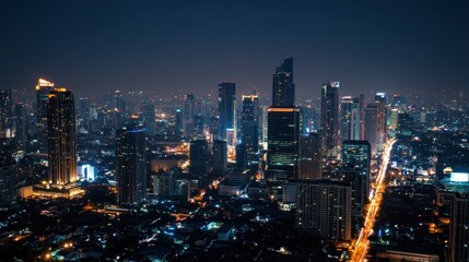 Obraz premium Nighttime Skyline of a Vibrant City