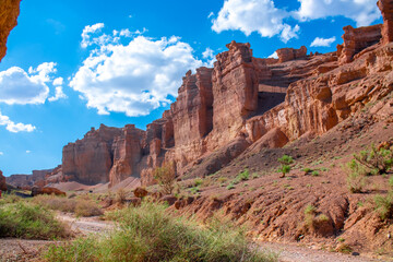 Fototapeta premium Charyn Canyon, Valley of Castles. The excellence of Kazakhstan. Panorama of natural unusual landscape. The red canyon of extraordinary beauty looks like a Martian landscape.