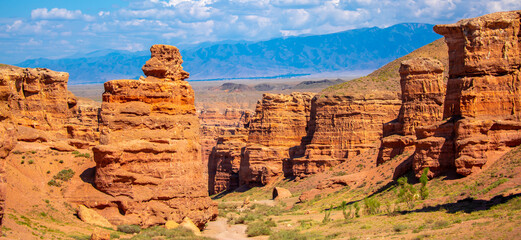 Charyn Canyon, Valley of Castles. The excellence of Kazakhstan. Panorama of natural unusual landscape. The red canyon of extraordinary beauty looks like a Martian landscape.