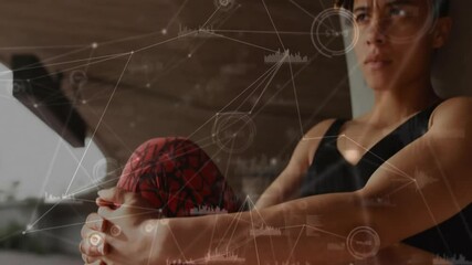 Network of connections and data processing animation over woman exercising indoors - Powered by Adobe