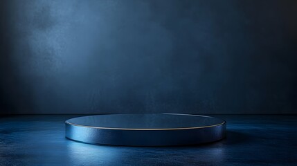 A round podium with a mirrored surface, reflecting soft ambient lighting, positioned against a dark, moody background.