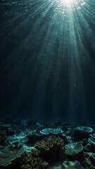 Obraz premium rays of light filtering down deep underwater background 