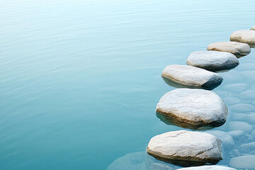 serene arrangement of stepping stones crossing tranquil blue water emphasizing calmness and peacefulness in nature