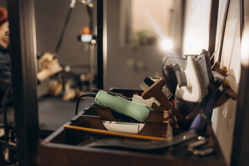 Groomer's items for animal care. a groomer is working in the background