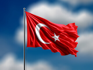 turkey flag flying on blur blue clouds background.