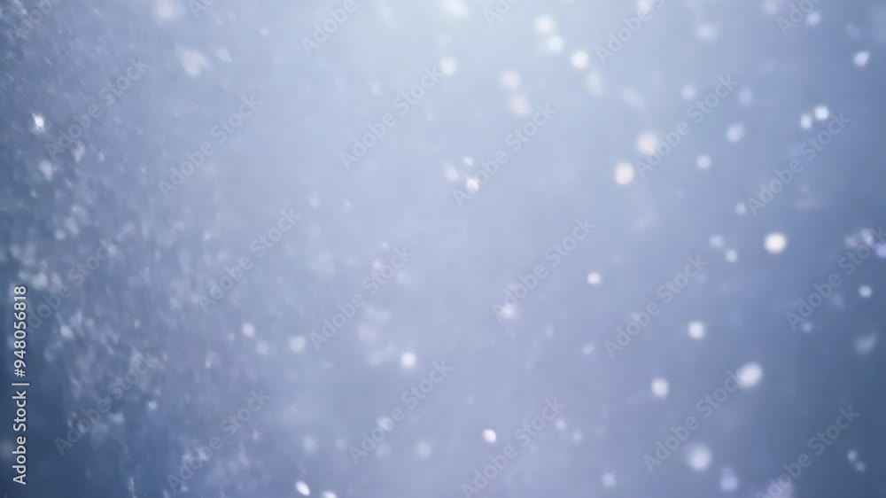 Poster glittering particles dance in soft blue light, creating a mesmerizing atmosphere in an enchanting se