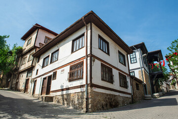 Fototapeta premium Historical Beypazarı district of Ankara. Magnificent historical buildings. Historical wooden and stone buildings from the Ottoman period in Beypazarı district. Beypazarı historical mansions.