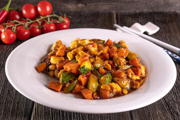 Chinese vegetables with beans on a wooden background. Food concept. Chinese food.