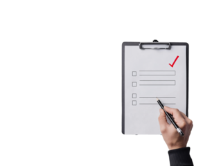 a hand holding a pen over a clipboard