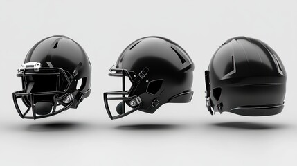 Fototapeta premium Three Black Football Helmets in Different Angles