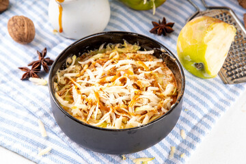 Apple pie shaved fruit ice, viral trendy snack with frozen apple shaving, cinnamon and caramel sauce