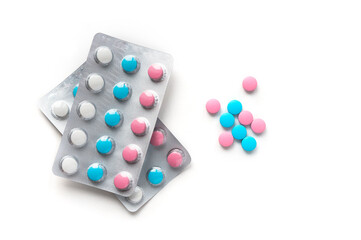 Blisters with pills, top view. Tablets on white background.