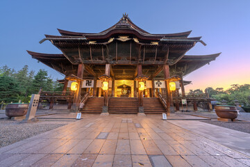 Zenkoji Temple, Nagano, Japan temple grounds and main hall at dawn.