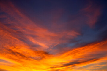 tranquil sky after sunset, displaying a smooth gradient of pastel pinks and blues, with the last...