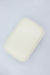White leather jewellery box. Compact storage case. Isolated background.