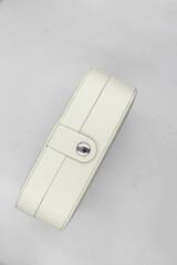 White leather jewellery box. Compact storage case. Isolated background.