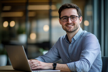 Smiling Businessman Laptop.