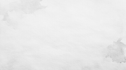 Obraz premium A white background with a few smudges and a few dots