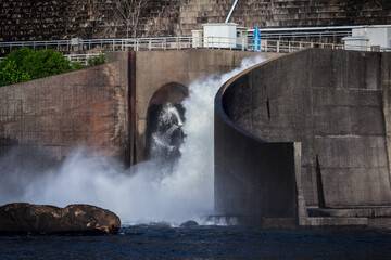 A large dam blocks water in Nakhon Nayok, Thailand.
