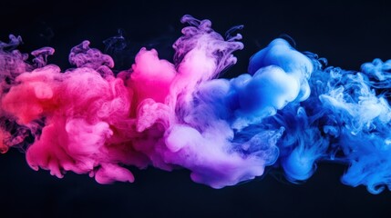 Fototapeta premium Vibrant swirls of pink and blue smoke create a mesmerizing abstract background.