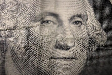 US president George Washington face portrait on the USA one dollar bill extreme macro, united states money closeup