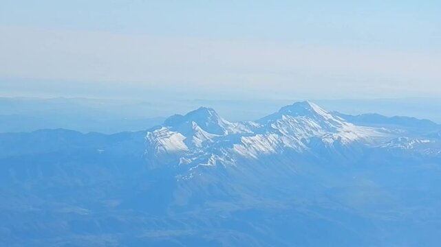 Aerial view over Mountain group of Gran Sasso d'Italia with snow and Calderone glacier in the Apennine Mountains in Abruzzo. Topics: Apennines, air travel, geography, Italy, Europe, weather