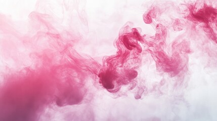 Fototapeta premium Beautiful swirling pink smoke creates an abstract background.