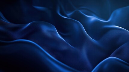 Fototapeta premium Abstract waves of deep blue fabric create a serene and elegant atmosphere.