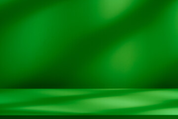 Empty table on green wall background. Composition with smooth shadows on the wall and light reflections. Mock up for presentation, branding products, cosmetics food or jewelry.	
