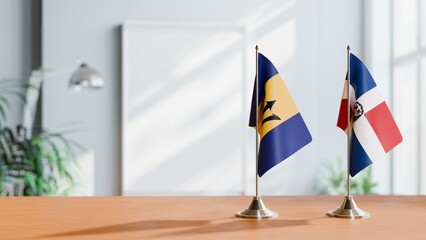 FLAGS OF BARBADOS AND DOMINICAN REPUBLIC ON TABLE