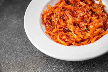 Braised cabbage suerkraut tomato sauce vegetable dish fresh delicious gourmet food background on the table rustick food top view copy space keto and paleo diet vegetarian and vegan food