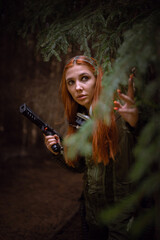 Girl an astranaut concept walking through the dark forest on another planet concept. Space traveler.