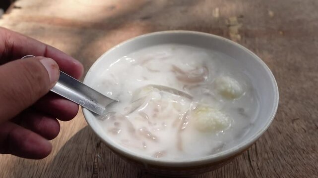 cendol is a traditional Indonesian food made from coconut milk and sugar