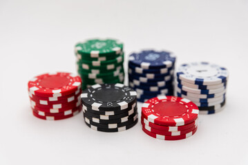 colourful poker chips on white background