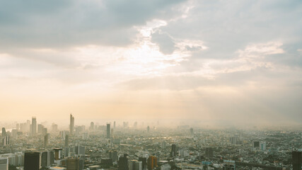Fototapeta premium An aerial view showing the city in Bangkok, Thailand in the morning. There is thick PM 2.5 dust covering the entire city. This is a picture that shows the problem of the changing environment.