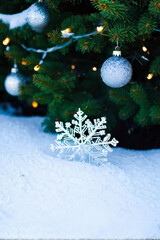 Festive Winter Banner with Glowing Snowflakes and Fir