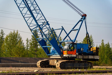 Large blue crane on a construction site