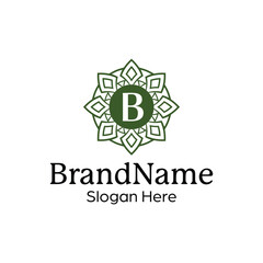 Elegant ornamental floral emblem logo design template