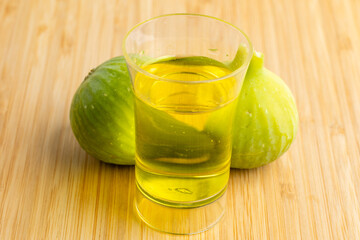 Liqueur with green fig alcohol ready for consumption
