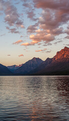Fototapeta premium Tranquil Mountain Lake with Majestic Peaks at Sunset