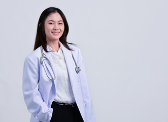 Young Asian female doctor in work clothes working in a hospital.