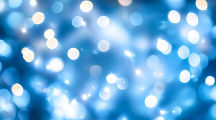 Winter background with glowing white bokeh lights on a blurry blue background. Christmas lights