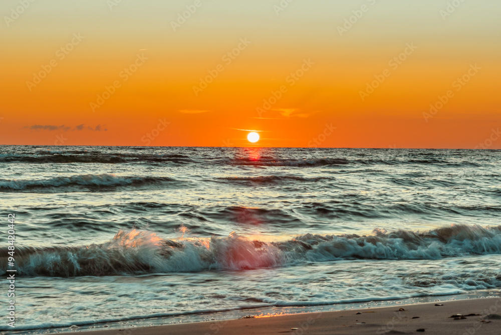 Wall mural Sunset on baltic sea at summer